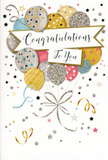 In this image, a celebratory congratulations card is shown front-on, its design capturing the feeling of a lively yet elegant party, the kind we often see after life's big achievements in Edgware. The focal point is a bouquet of illustrated balloons, gathered closely together in a loose cluster that seems to gently rise off the page. Their colours range from luminous gold and polished silver to soft champagne, powder blue, rose pink, and misty grey, all delicately shaded to suggest a subtle sheen. Each balloon is decorated with its own motif-tiny metallic stars scattered like constellations, glimmering stripes, and fine speckles of glitter-giving the whole arrangement a sense of movement and sparkle. Slender ribbons in gold and silver trail from the base of the balloons, curling and looping with a dancer's grace before uniting into a single, decorative flourish, reminiscent of the way we tie ribbon around a finished bouquet in our Edgware workshop. A flowing banner stretches across the centre, carrying the message 'Congratulations To You' in elegant, looping calligraphy that suggests genuine affection and pride. Surrounding the main design, the background is dusted with star-shaped confetti and whimsical swirls, all rendered in metallic inks that look as though they would catch the light of a nearby lamp in a cosy Edgware living room. The overall atmosphere is light, joyful, and polished-perfect for pairing with fresh flowers to celebrate exam results, a new role, or any hard-won success that deserves a heartfelt, beautifully presented well done.